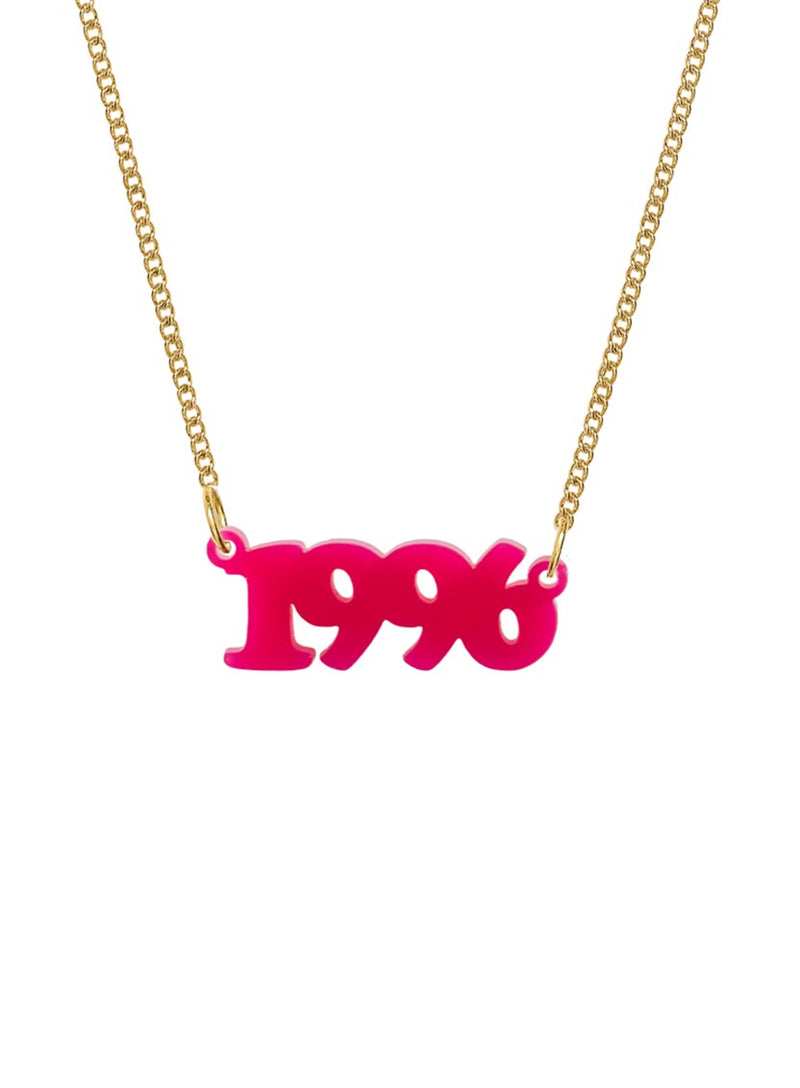 Custom personalised acrylic Name necklace with a gold chain and a bright pink pendant spelling out the year '1996' in a bold, 3D font, shown against a plain white background.