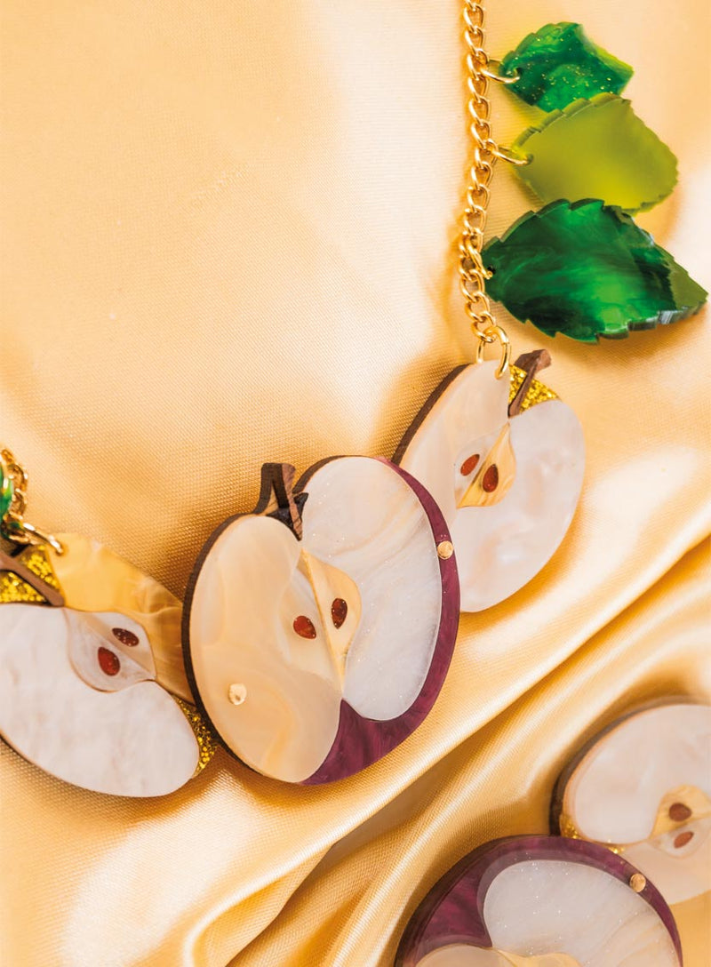 Apple of Discord Necklace Flatlay