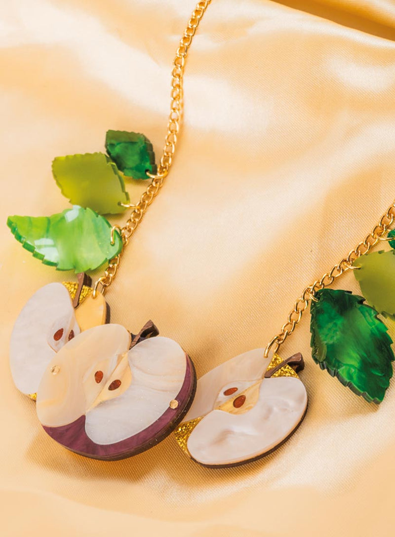 Apple of Discord Necklace Flatlay