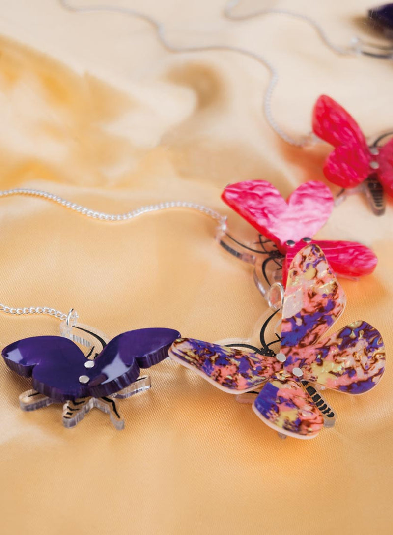 Kaleidoscopic Butterfly Necklace Flatlay