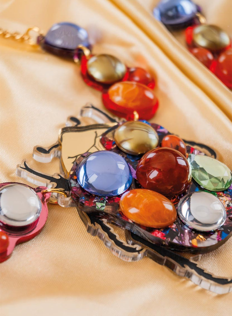 Metamorphosis Beetle Necklace Flatlay