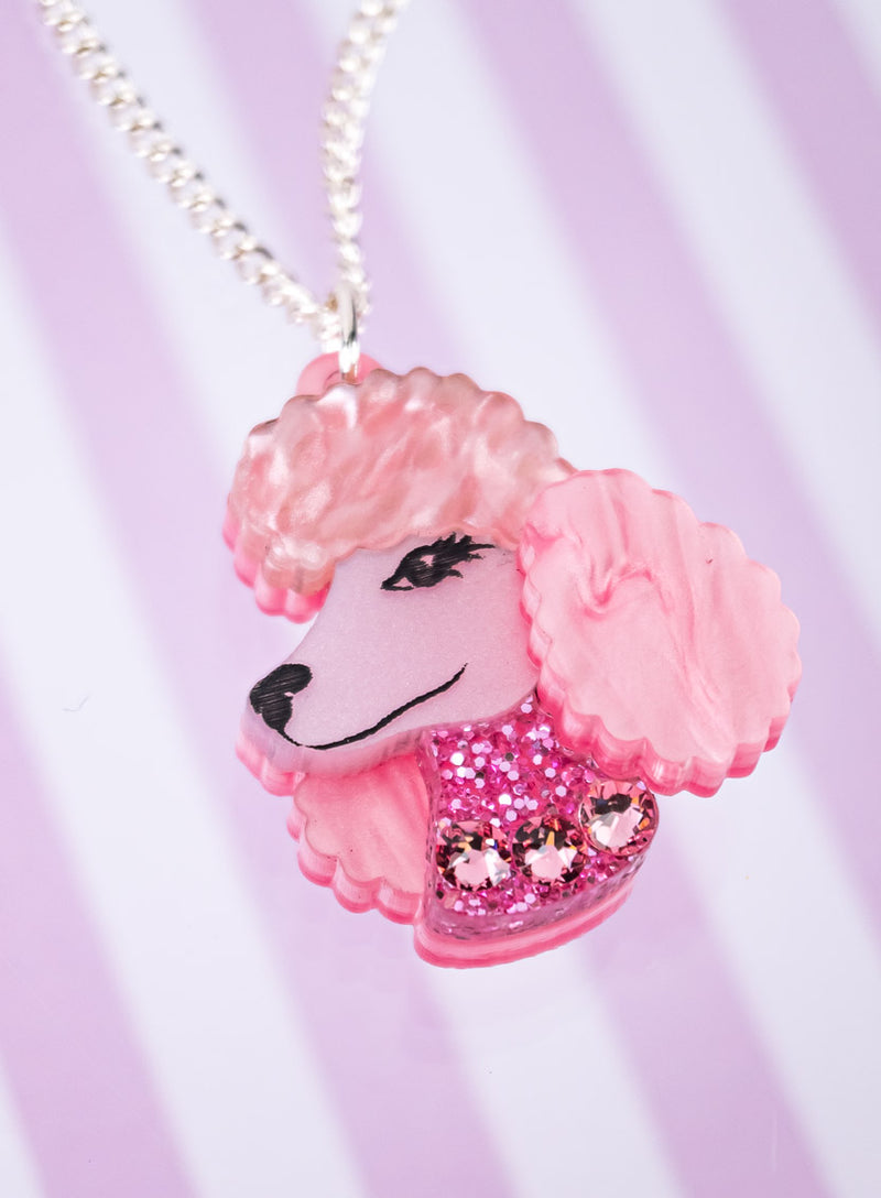 Pink Poodle Pendant Flatlay