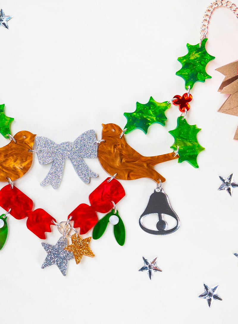 Flaylay Christmas Spirit Statement Necklace surrounded by stars