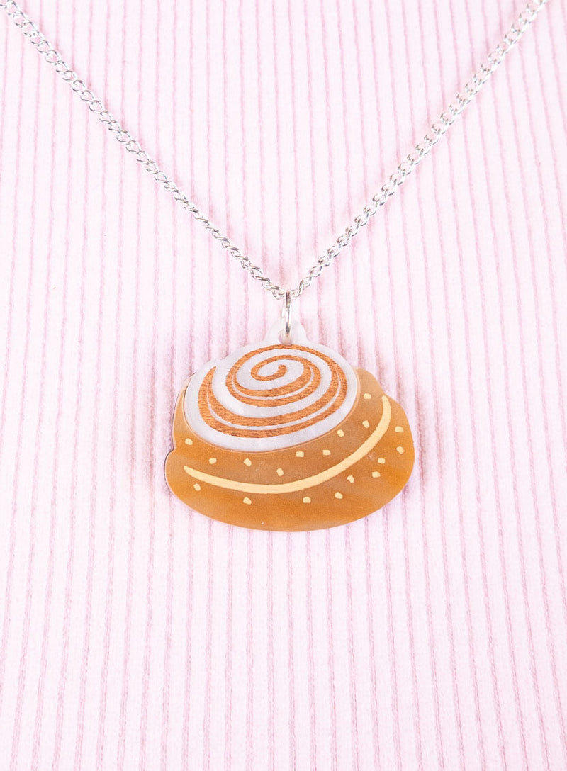 Close up detail of the etch and inking on the Cinnamon Roll Pendant