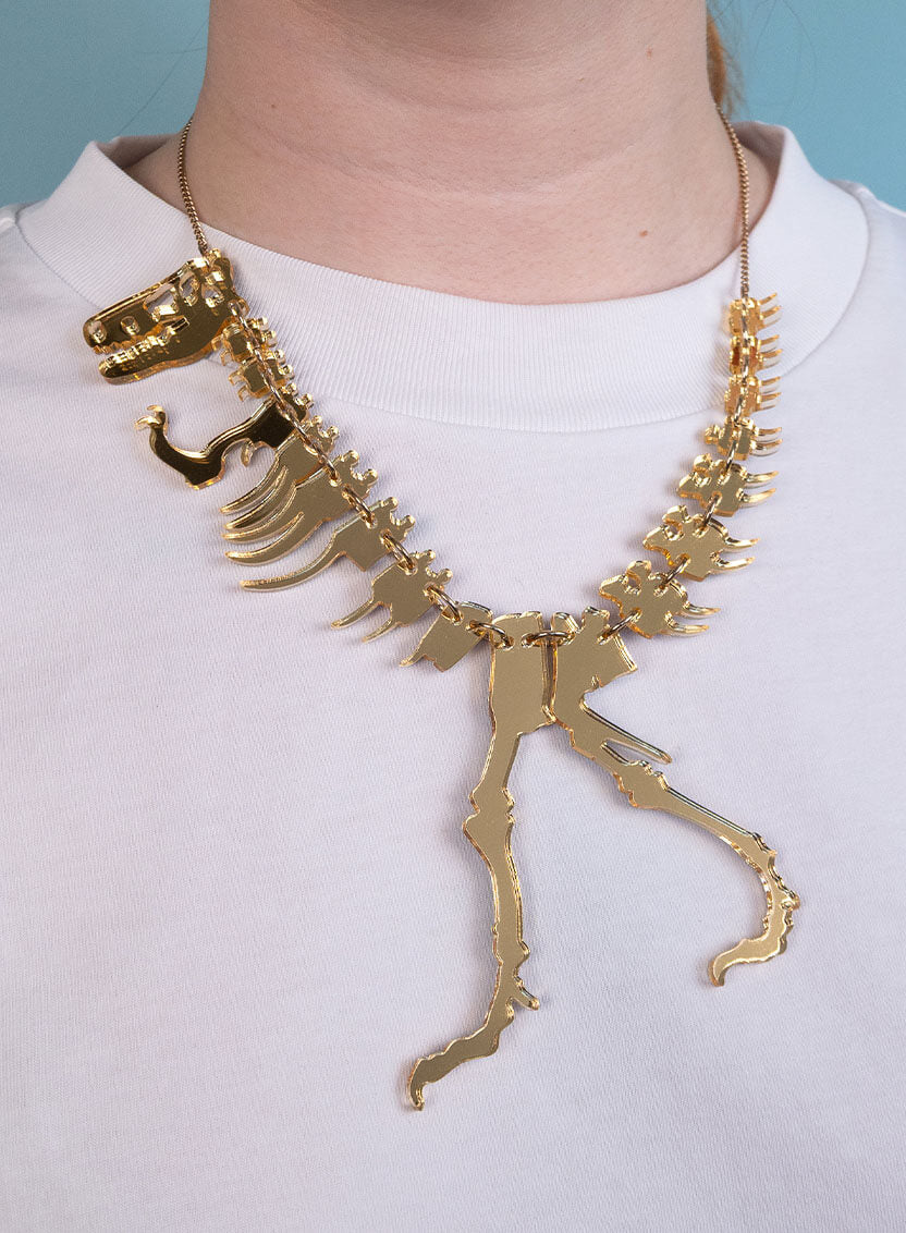 Gold Mirror Dinosaur Skeleton Necklace by Tatty Devine
