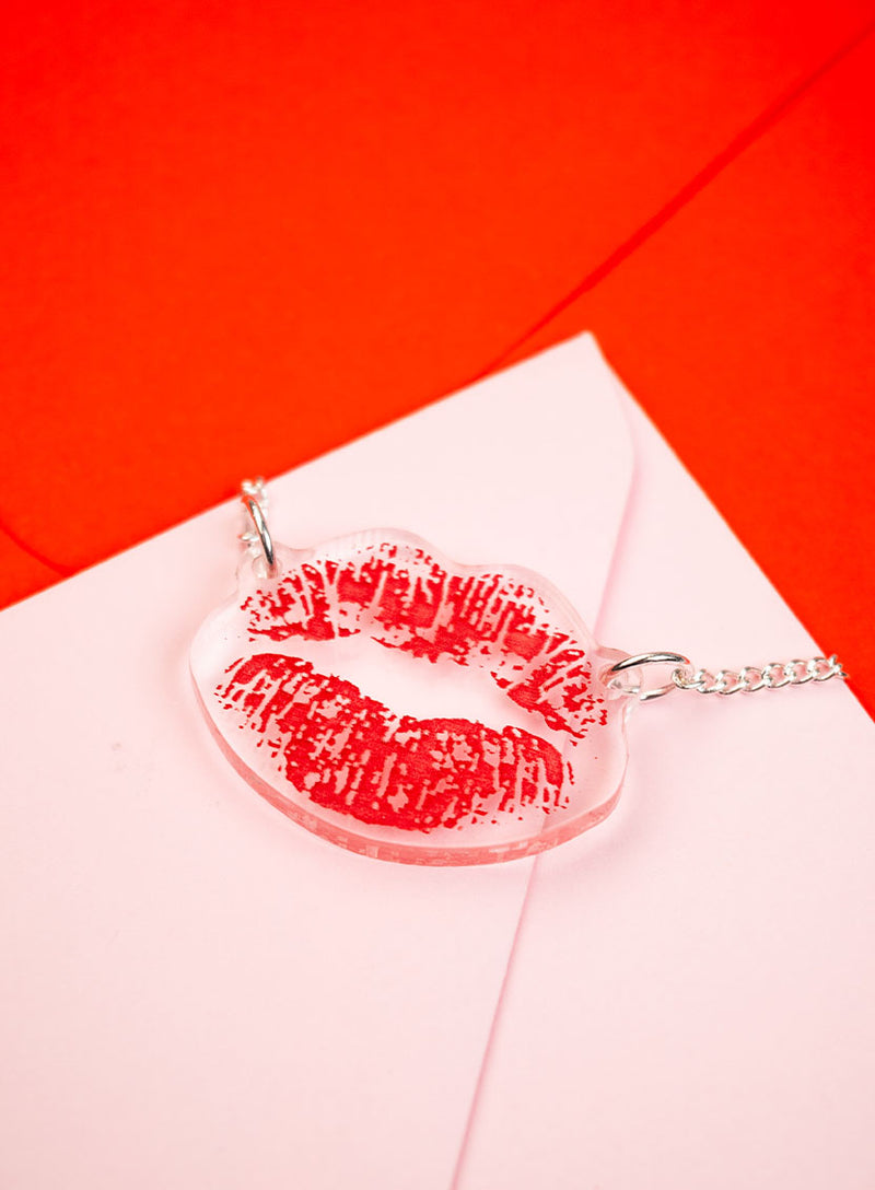Lipstick mark necklace etched and inked on recycled clear acrylic