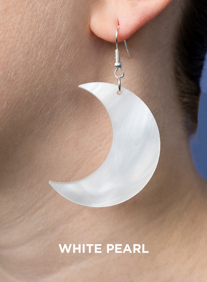 Large moon earrings made from white pearl acrylic