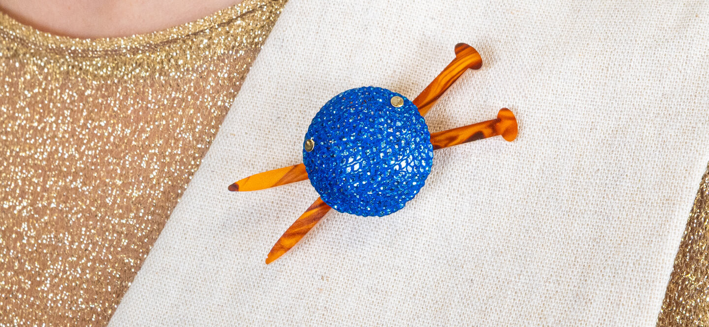 Ball of wool brooch.