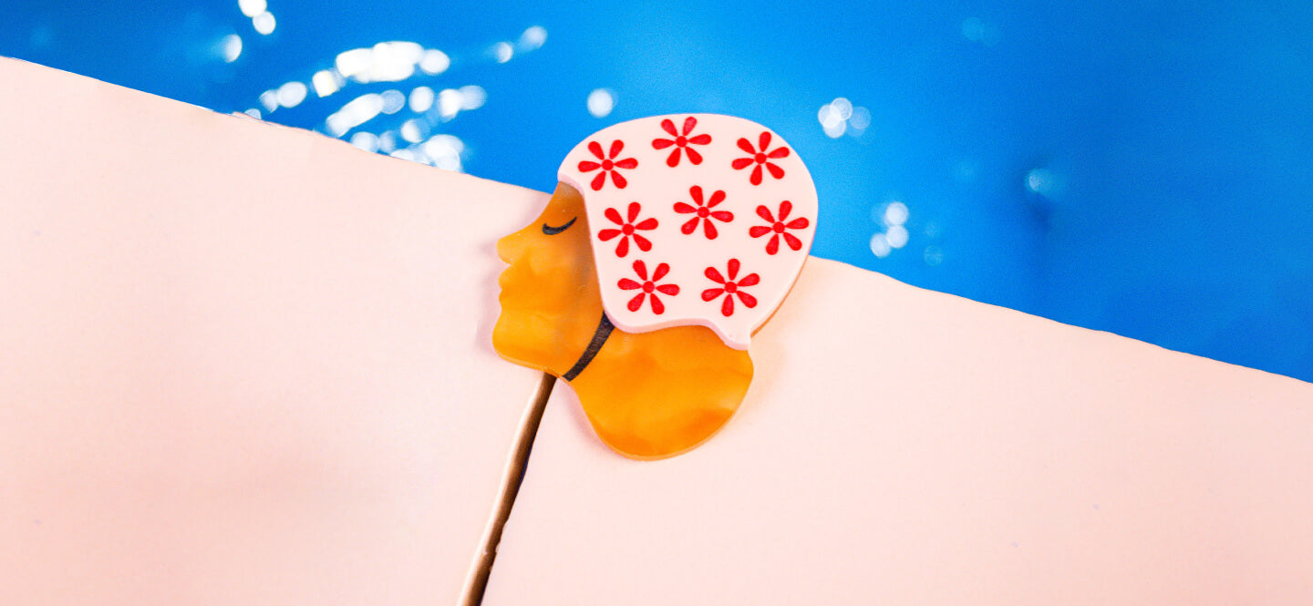 Jewellery inspired by swimming and water by Tatty Devine.