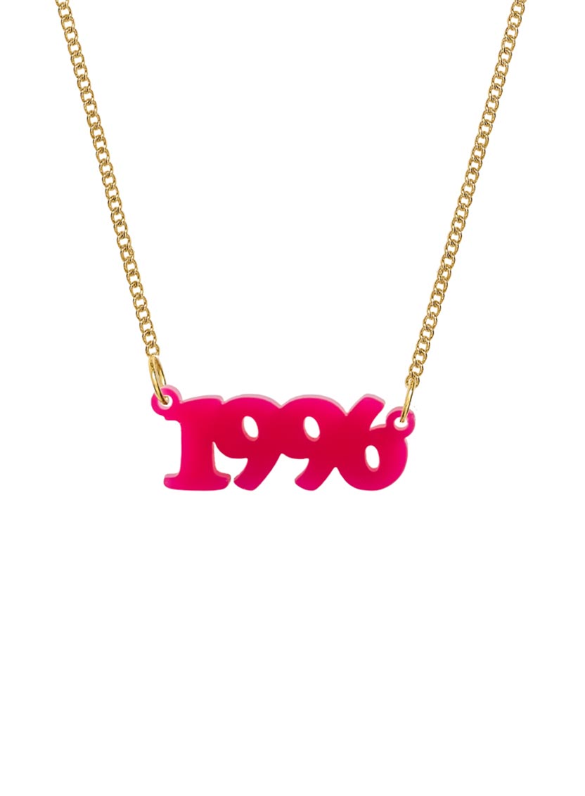 Custom personalised acrylic Name necklace with a gold chain and a bright pink pendant spelling out the year '1996' in a bold, 3D font, shown against a plain white background.