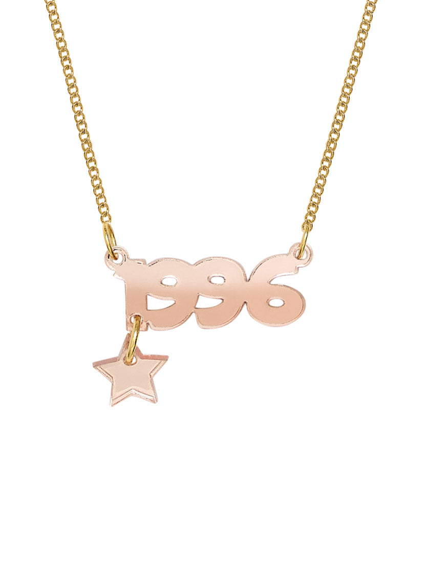 Deluxe Name Necklace in Rose Gold acrylic that says '1996' with a star charm.