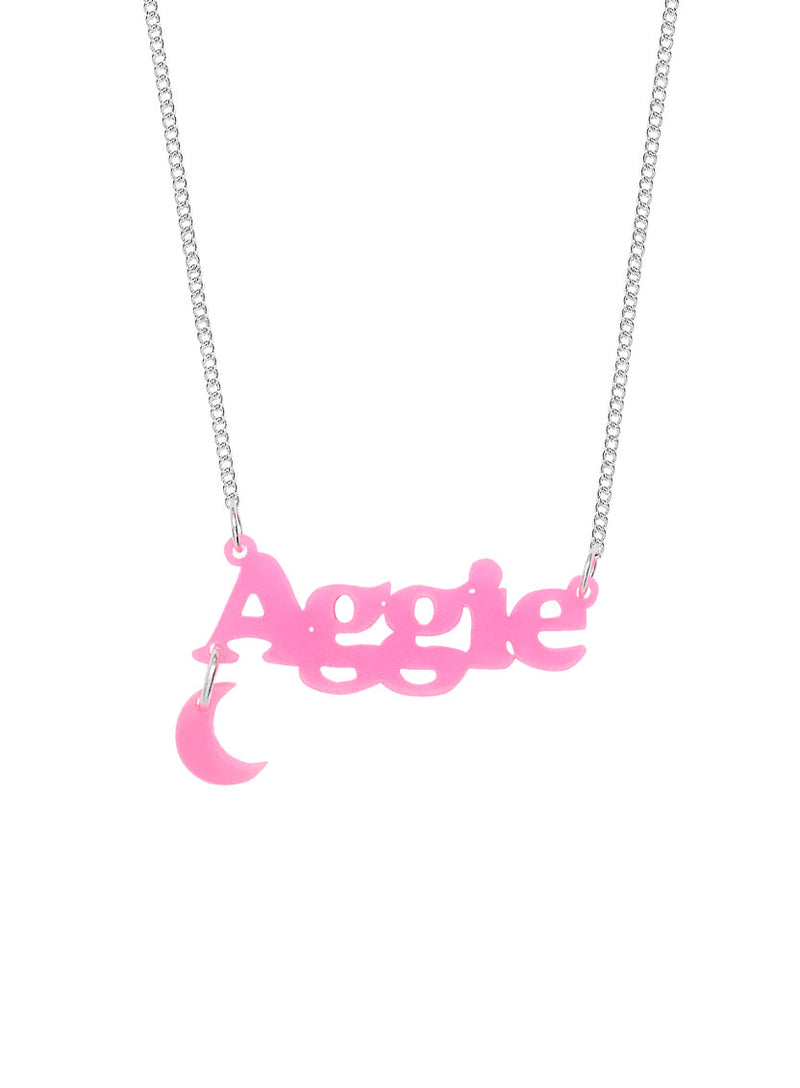 Pink glow in the dark Name Necklace that says 'Aggie', with a moon shaped charm.