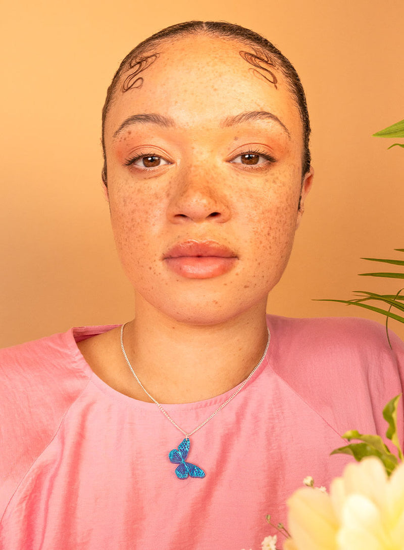 Blue butterfly pendant necklace