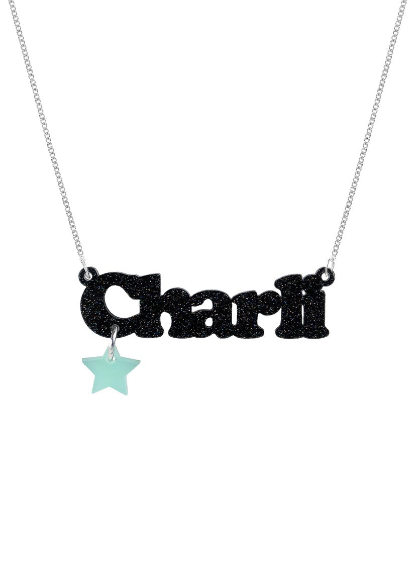 Personalised deluxe Name Necklace that says 'Charli' in black glitter acrylic with a star charm on a silver chain.