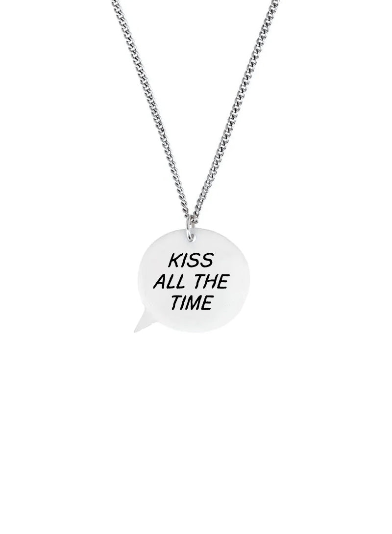 Speech bubble necklace with the caption 'Kiss all the time'