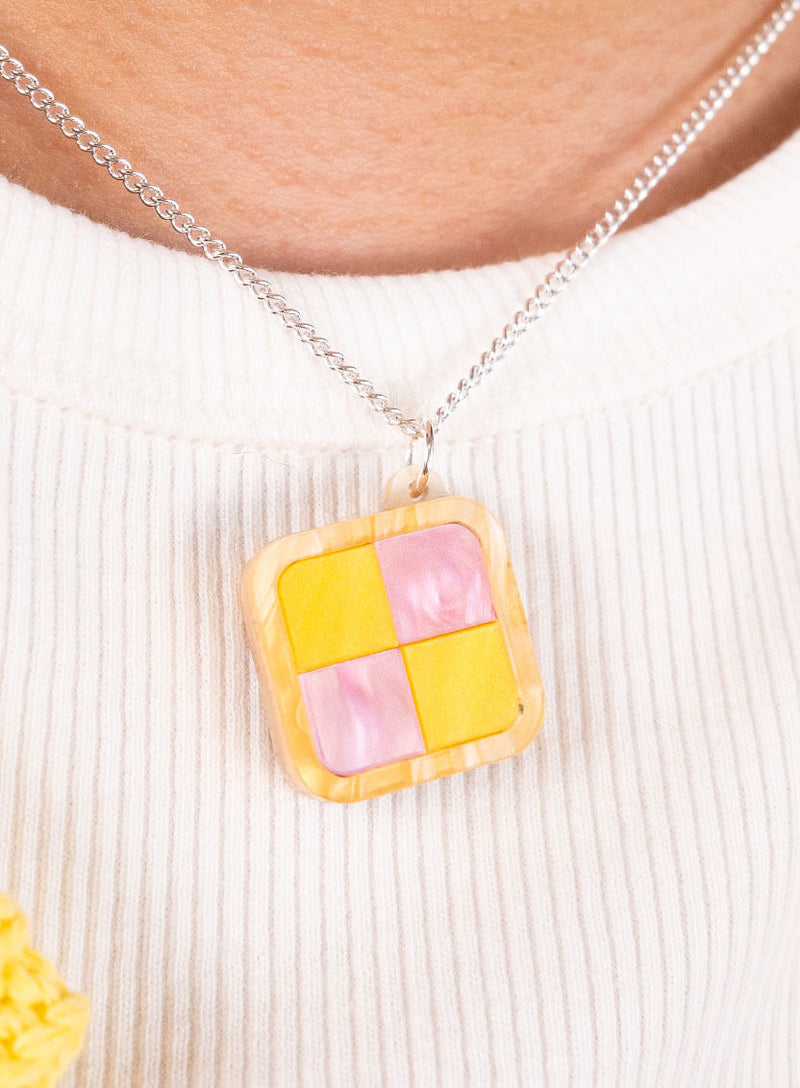 Battenberg Cake Pendant handmade from pearlescent pink and yellow acrylic