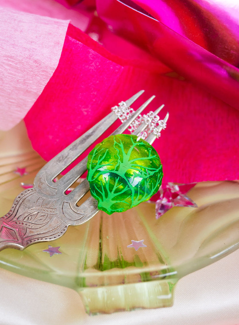 Brussels Sprout Necklace wound around a fork
