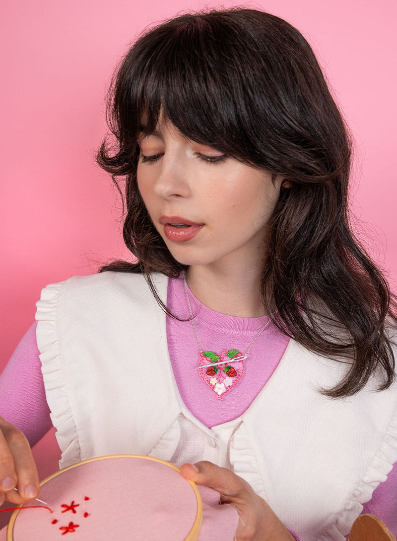 Embroidery Heart Necklace made from clear recycled acrylic etched and inked and adorned with strawberries