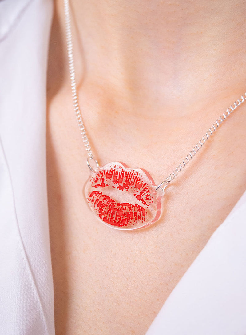 Lipstick mark necklace etched and inked on recycled clear acrylic