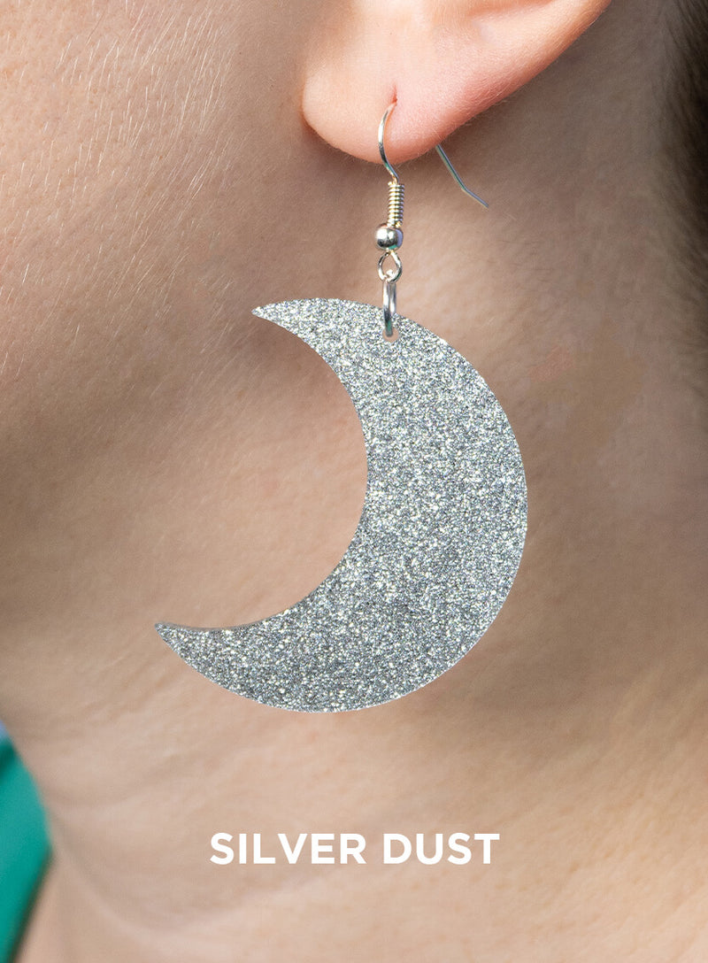 Large moon earrings made from silver dust glitter acrylic