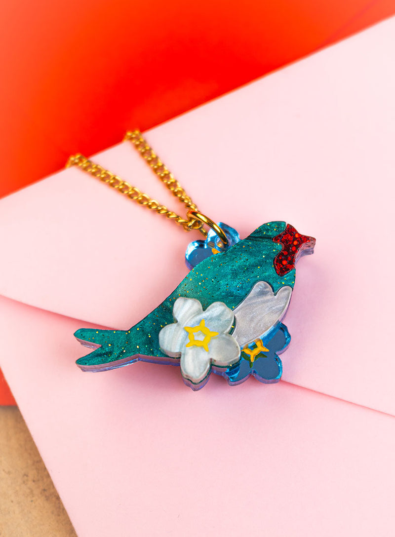 Love Bird Pendant handmade from glitter-flecked acrylic