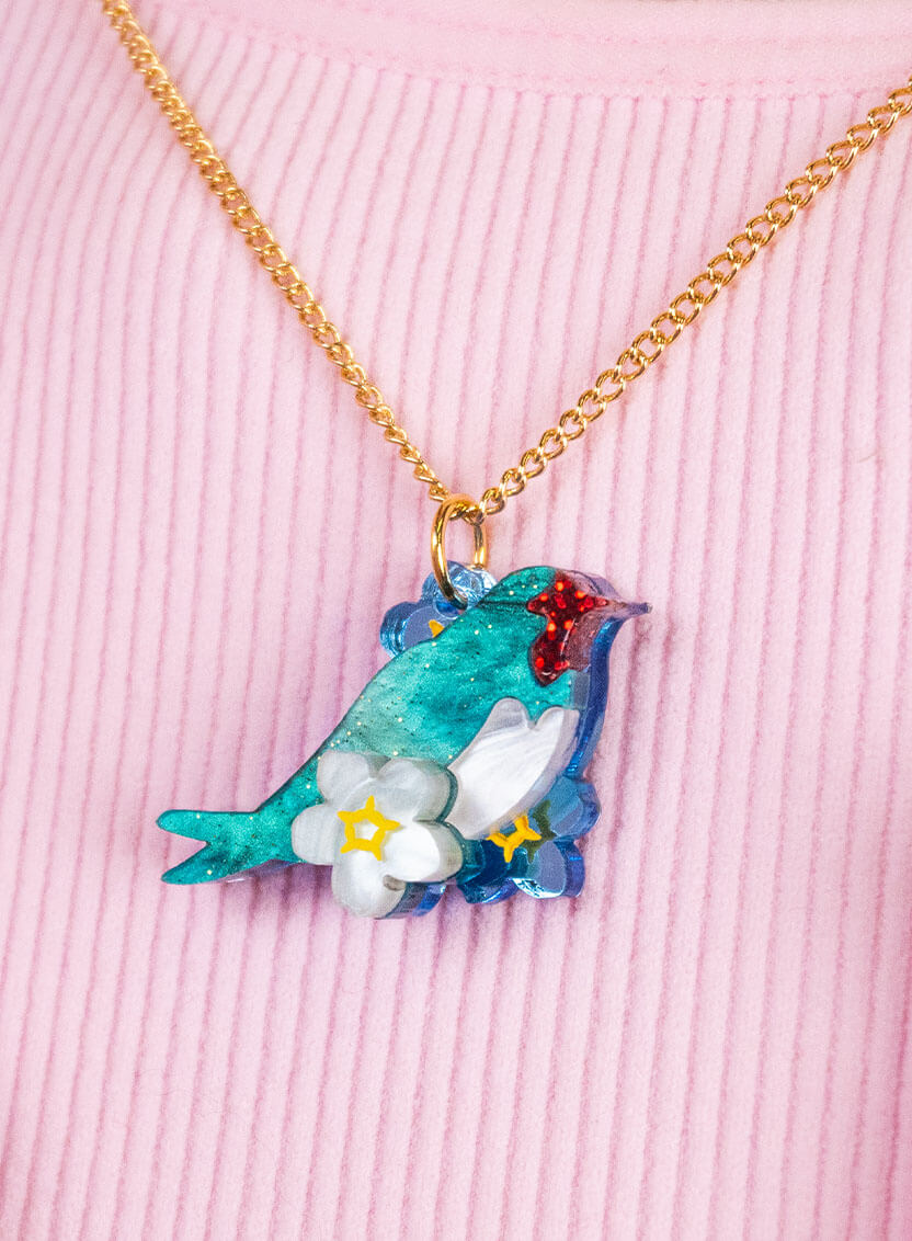 Love Bird Pendant handmade from glitter-flecked acrylic