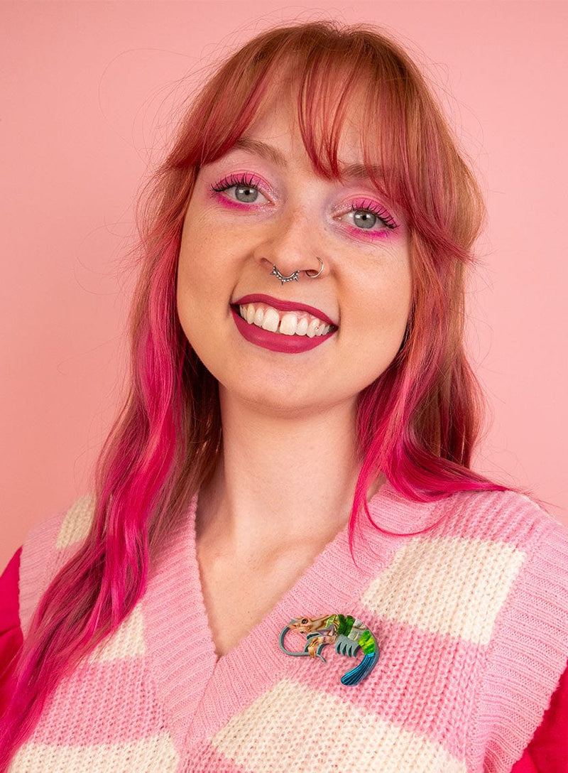 Green Pearly Prawn Brooch pinned on a pink stripe vest